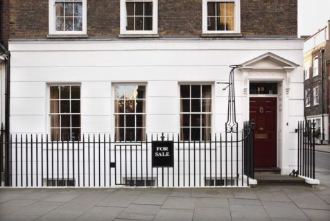 "For Sale" sign outside a house in London